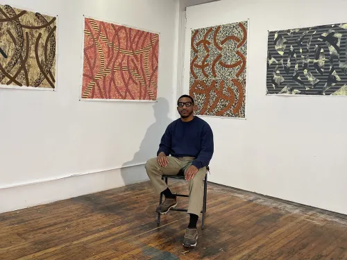 Marvin Brown sitting on a stool