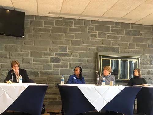 Women's Leadership Panel sitting at a table