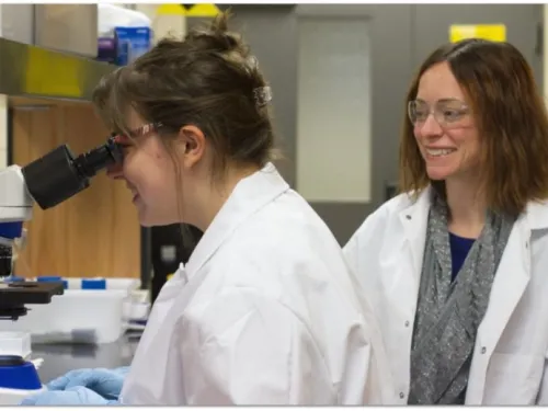 Faculty member and student in lab