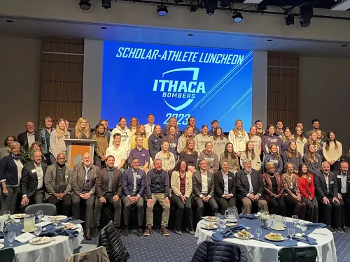 Group shot of student athletes and faculty, board and admin members