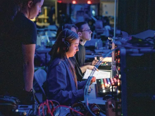 Student at a switchboard