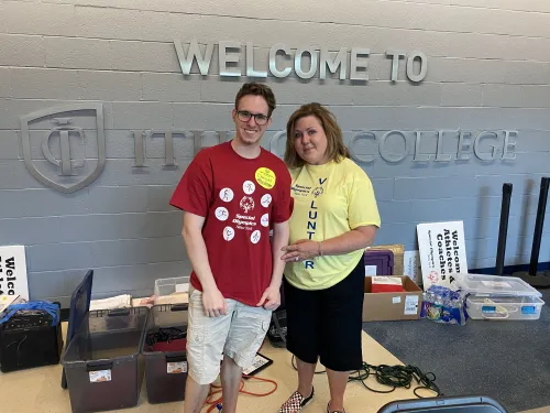 People in front of IC sinage