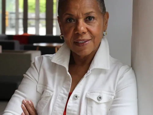 Woman wearing white shirt.