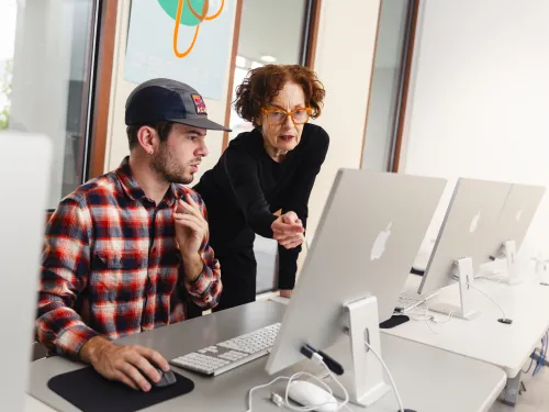 Professor working with student