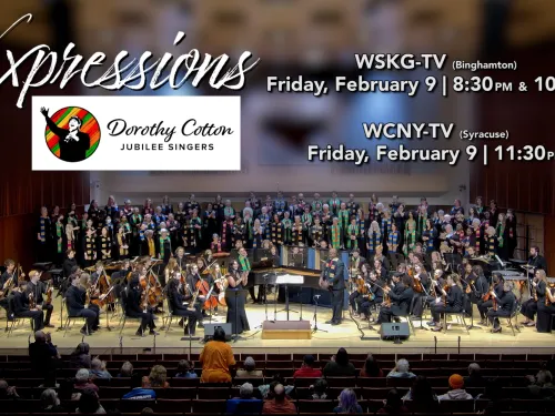 Singers performing on a stage.