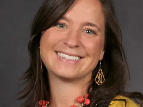 woman wearing yellow sweater