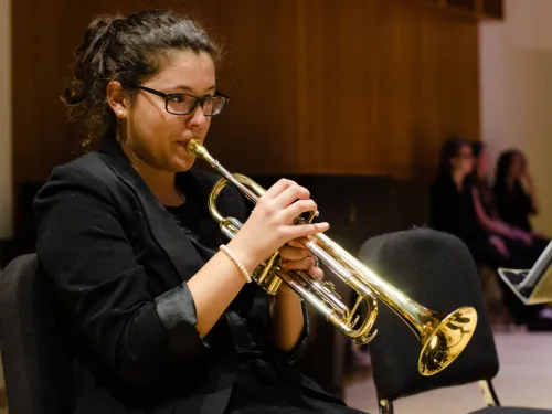 Person playing trumpet