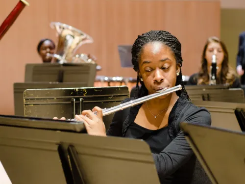 person playing the flute