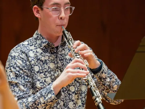 person playing oboe