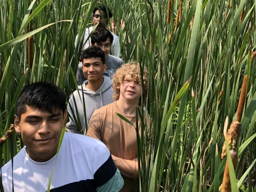 Summer students on a field trip in nature.
