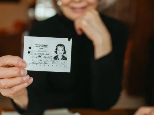 Hari Kern '64 shows her IC ID from 1960