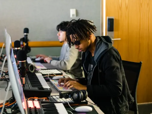 student in a music technology classroom