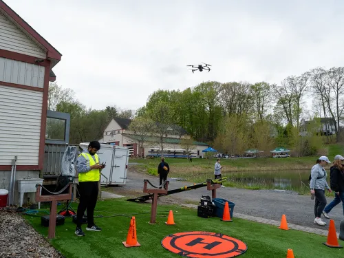 Student flying drone