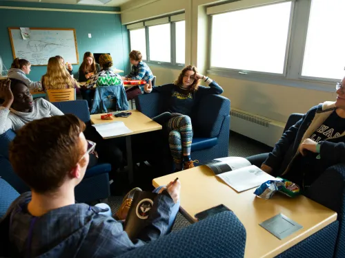 Students relaxing and playing games in the lounge