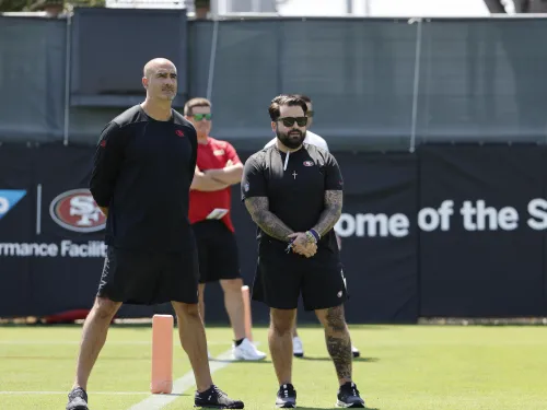 Tariq Ahmad standing on a field