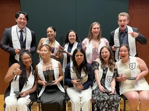 Student leaders posing with their awards