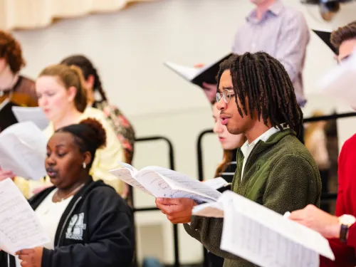 student singing in choir