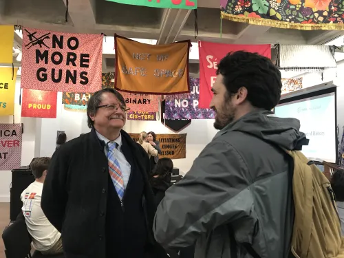 Student and professor speaking