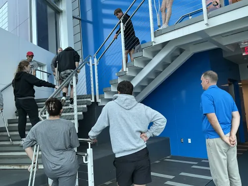 Students practicing crutches