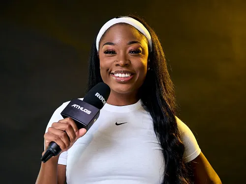 Katelyn holding a mic