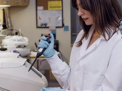 Kari Brossard Stoos in the lab