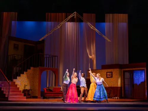 College students perform in a play.