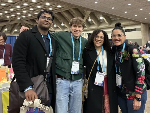 Ashan Chandrasena (’26) , Cormac Abbey ('26), and author Kai CogginPete Dorman ('27), 