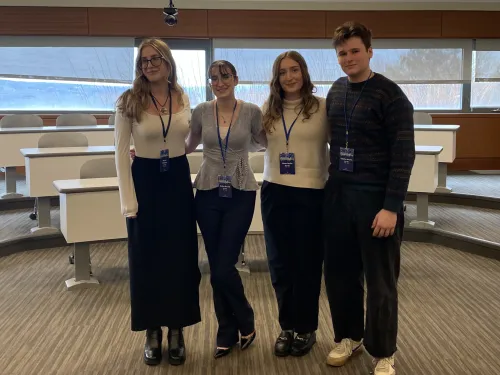 4 students presenting research