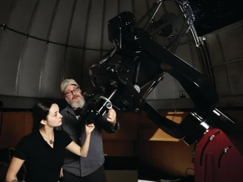 Winter Paul '26 and Dr. Matthew Price at the Clinton Ford Observatory.