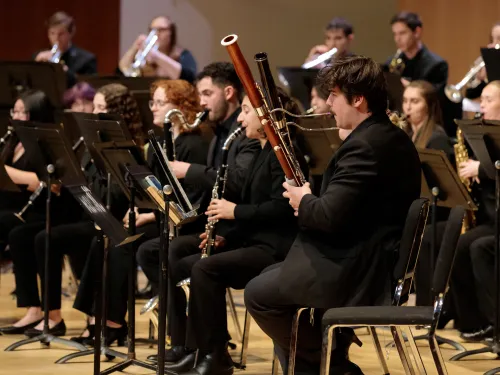 student plays bassoon in an ensemble