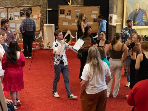 Students on the red carpet in Dillingham Lobby