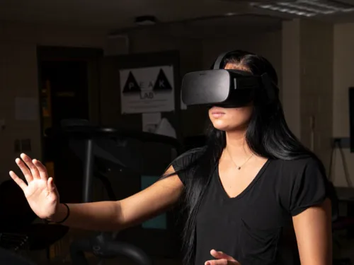 Women engaging in virtual reality research in mental and cognitive performance