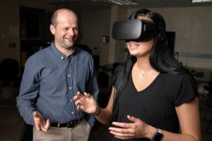 Student works with professor in virtual reality lab