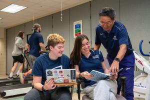 Ithaca College students review information