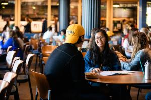 Students socializing in campus center.
