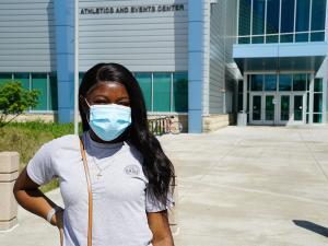 student wearing a mask on campus