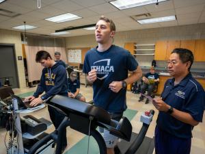 Student running on treadmill