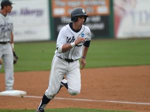Tim Locastro running the bases while playing for Ithaca College