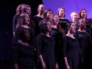 students singing in a choral group