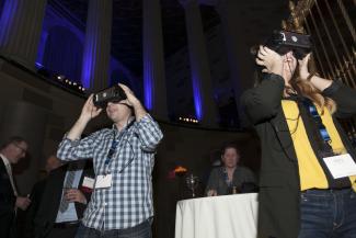 Attendees wearing virtual reality headsets