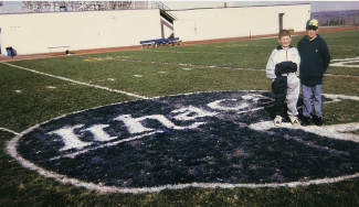 Kevin and Mark on the 50-yard line at Butterfield Stadium.
