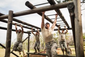 soldiers on monkey bars