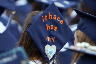 mortarboard with the words "Ithaca as my heart"