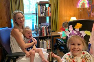 Lauren Britton and her children working from home