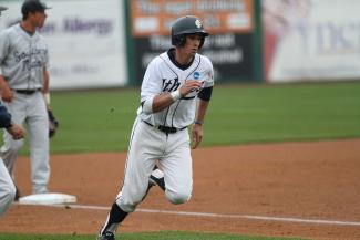 Tim Locastro running the bases while playing for Ithaca College