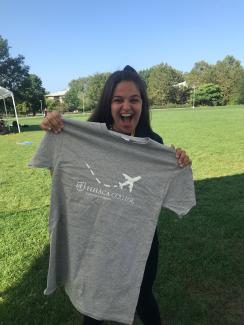A PAL shows off her free t-shirt.