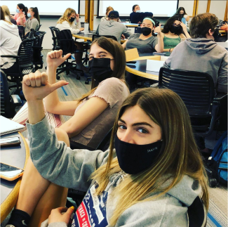 Students in PHYS 102 practice the right-hand rule.
