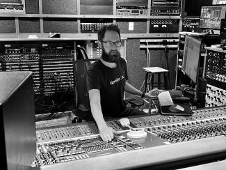 Man sitting at a recording console