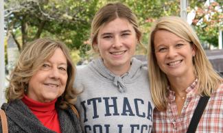 female Ithaca College student with two female family members