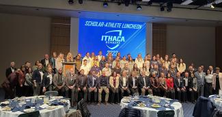 Group shot of student athletes and faculty, board and admin members